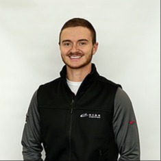 Director of Training & Development Cody Evanson in Group at Eide Ford